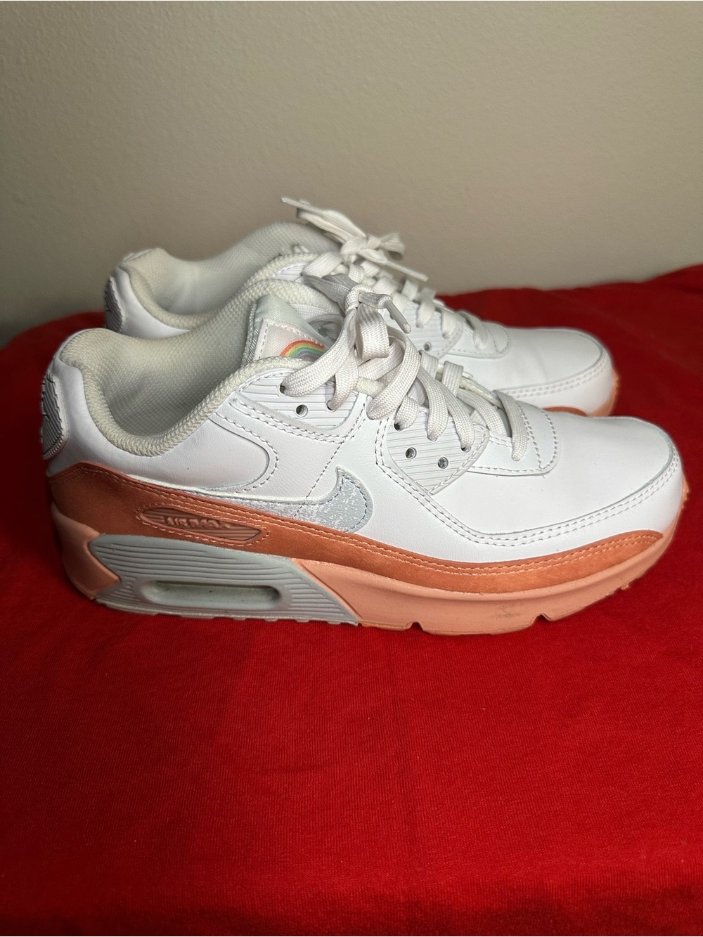 Nike Kids White Athletic Sneakers with Peach Accents